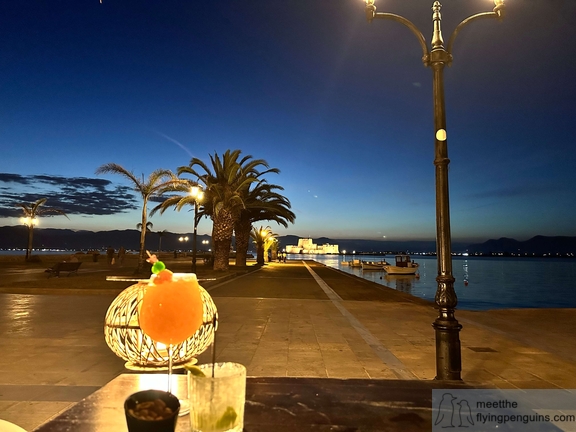 A cocktail from the port with a view of the Bourtzi